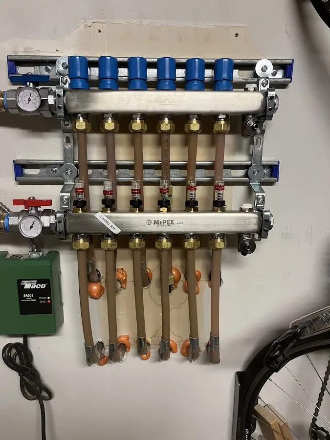 Plumber performing Gas Line Installation at a residential property in Aurora