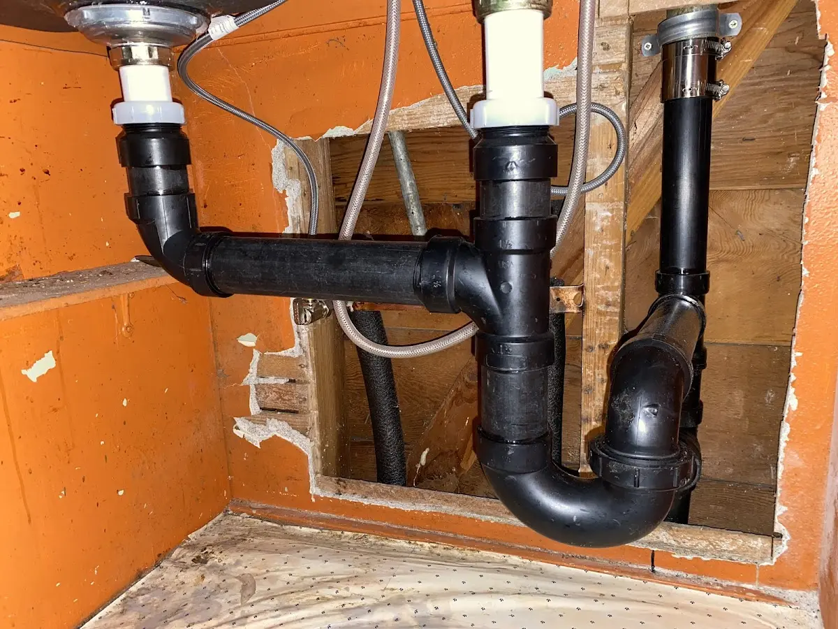 Professional Garbage Disposal Repair equipment and tools on the job in Aurora